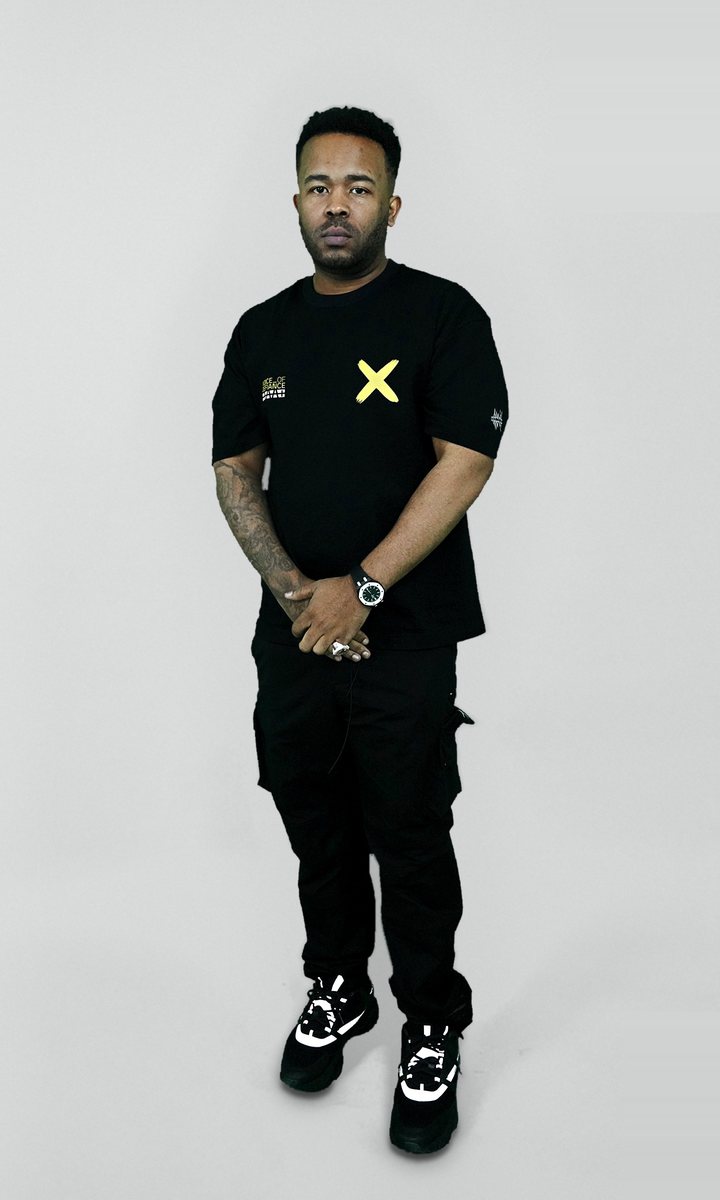Milli Major in the SEE IT DEH tee in the Not For Sale studio.