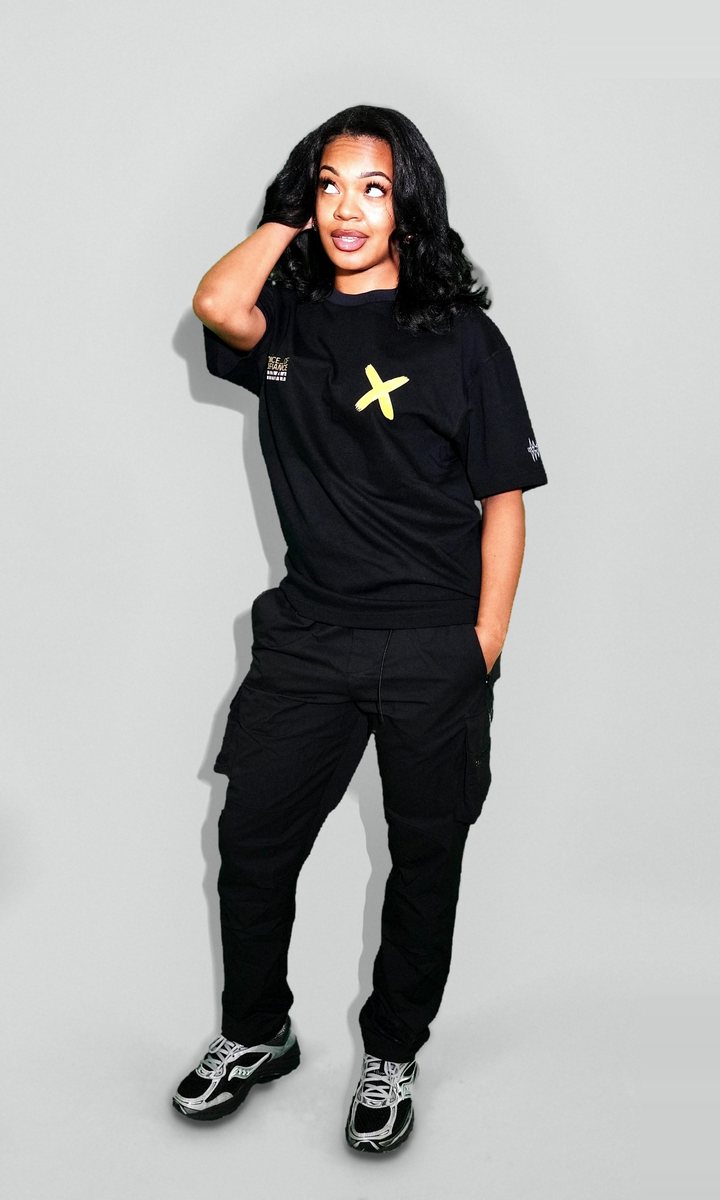 Livita J in the SEE IT DEH tee in the Not For Sale studio.