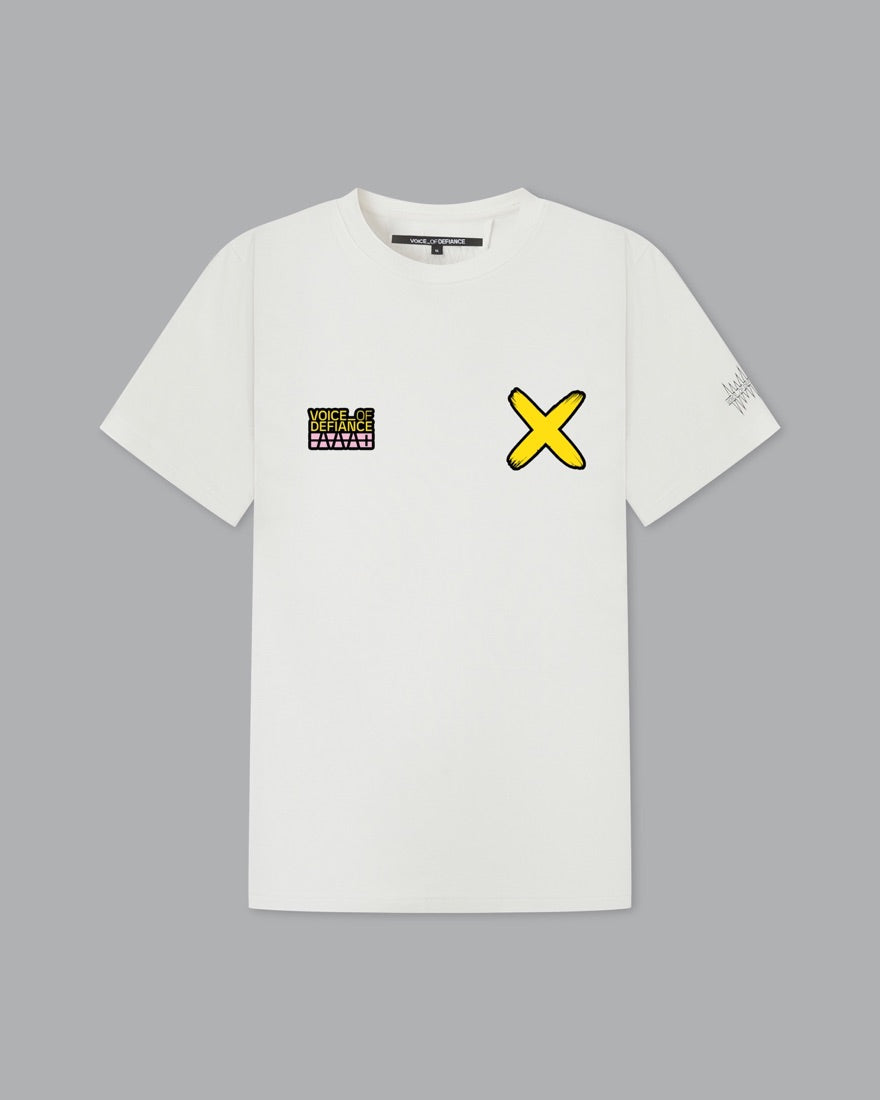 White tee, front: Voice_Of Defiance AAA+ mark left chest, yellow X right chest.
