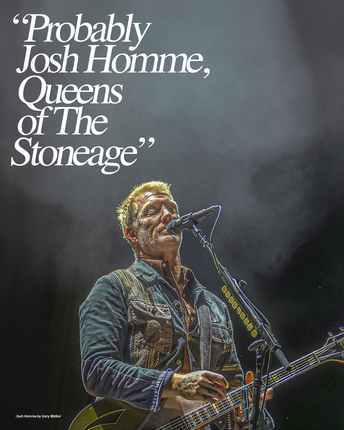 Musician performing on stage with text overlay 'Probably Josh Homme, Queens of The Stoneage'.